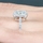 Amerie's  2.5 Carat Cushion Cut Halo Engagement Ring