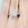 Amerie's  2.5 Carat Cushion Cut Halo Engagement Ring
