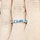 Astrid's Blue Marquise Cut CZ Eternity Band
