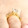 Dao's Goldtone CZ Wedding Ring Set