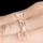 Devera's Twisted CZ Engagement Ring - Rose Goldtone