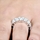 Ellie's Silvertone Emerald Cut CZ Eternity Ring