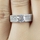 Emiliya's 5 Row CZ and Silvertone Engagement Ring