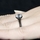 Enya's Black Plated Round Cut Engagement Ring