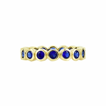 Joy's Goldtone Eternity Ring - Blue CZ