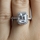 Karda's 3.5ct Emerald Cut CZ Halo Engagement Ring