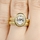 Lisa's Goldtone Halo Oval Cut CZ Wedding Ring Set