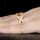 Millicent's Rose Goldtone Champagne CZ Twisted Engagement Ring