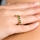 Joy's Goldtone Eternity Ring - Green CZ