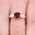 Simulated Ruby and CZ 3 Stone Engagement Ring - Goldtone