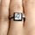Cassia's Princess Cut Black and White CZ Wedding Ring Set