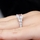 Saraya's 3 Stone Asscher Cut CZ Engagement Ring